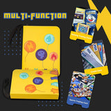 a yellow wallet with a picture of balloons and credit cards with text: 'TRAINER Finder Discard of the other cards from MULTI-FUnCTION card your your hand. Machamp 100 HP Gaming Trading Cards master Card VISA VISA CARD VISA Credit Card 012 0197 Sports Trading Card'